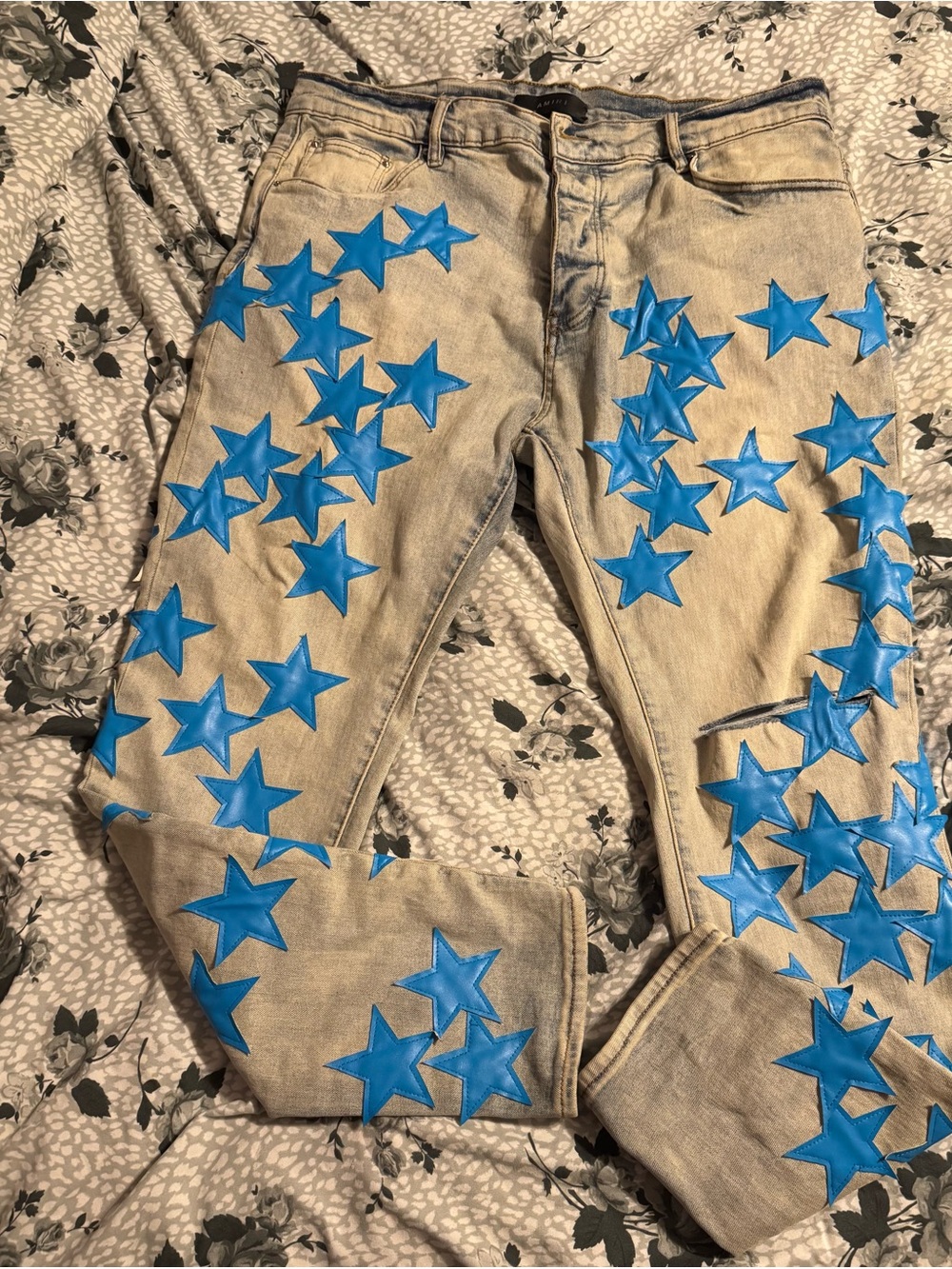 AMIRI Light Denim Skinny Jeans with Blue Star Appliqués
